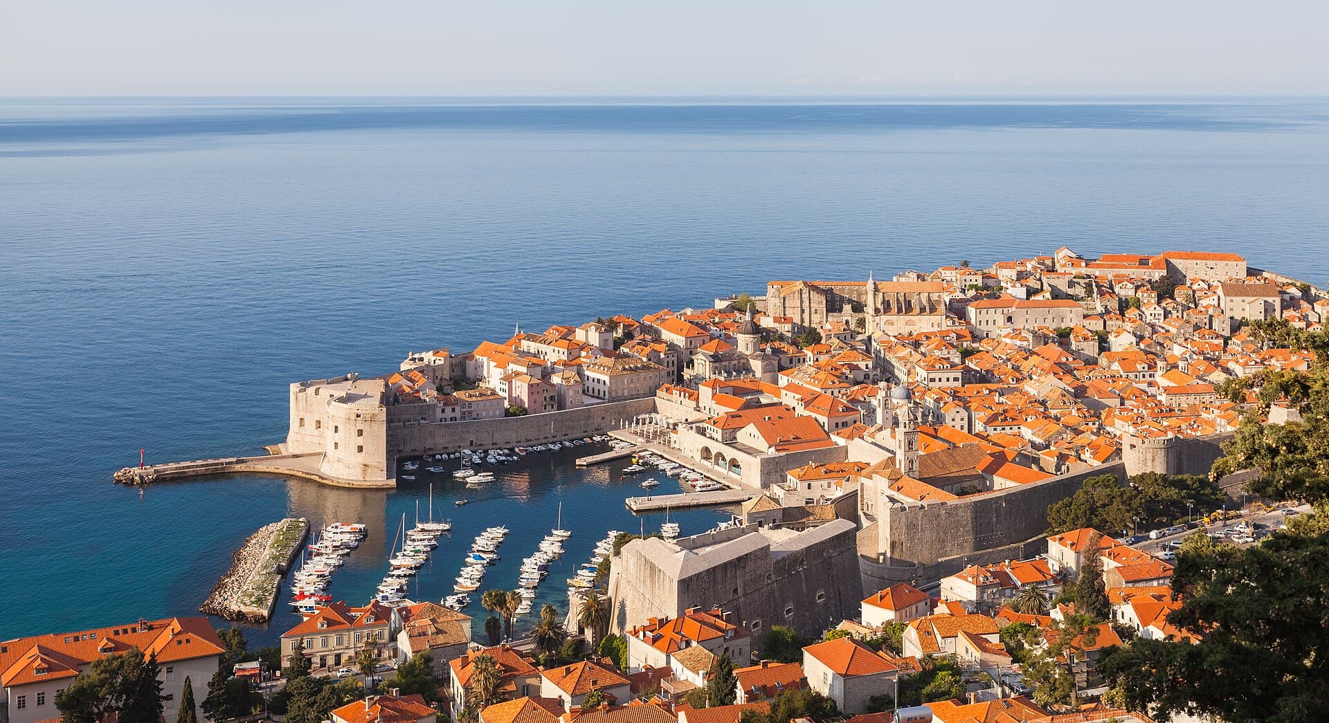 Dubrovnik travel planning photo showing Early morning view of the Old Town of Dubrovnik and its city walls, an UNESCO Heritage Site since 1979. The former Republic of Ragusa was a
