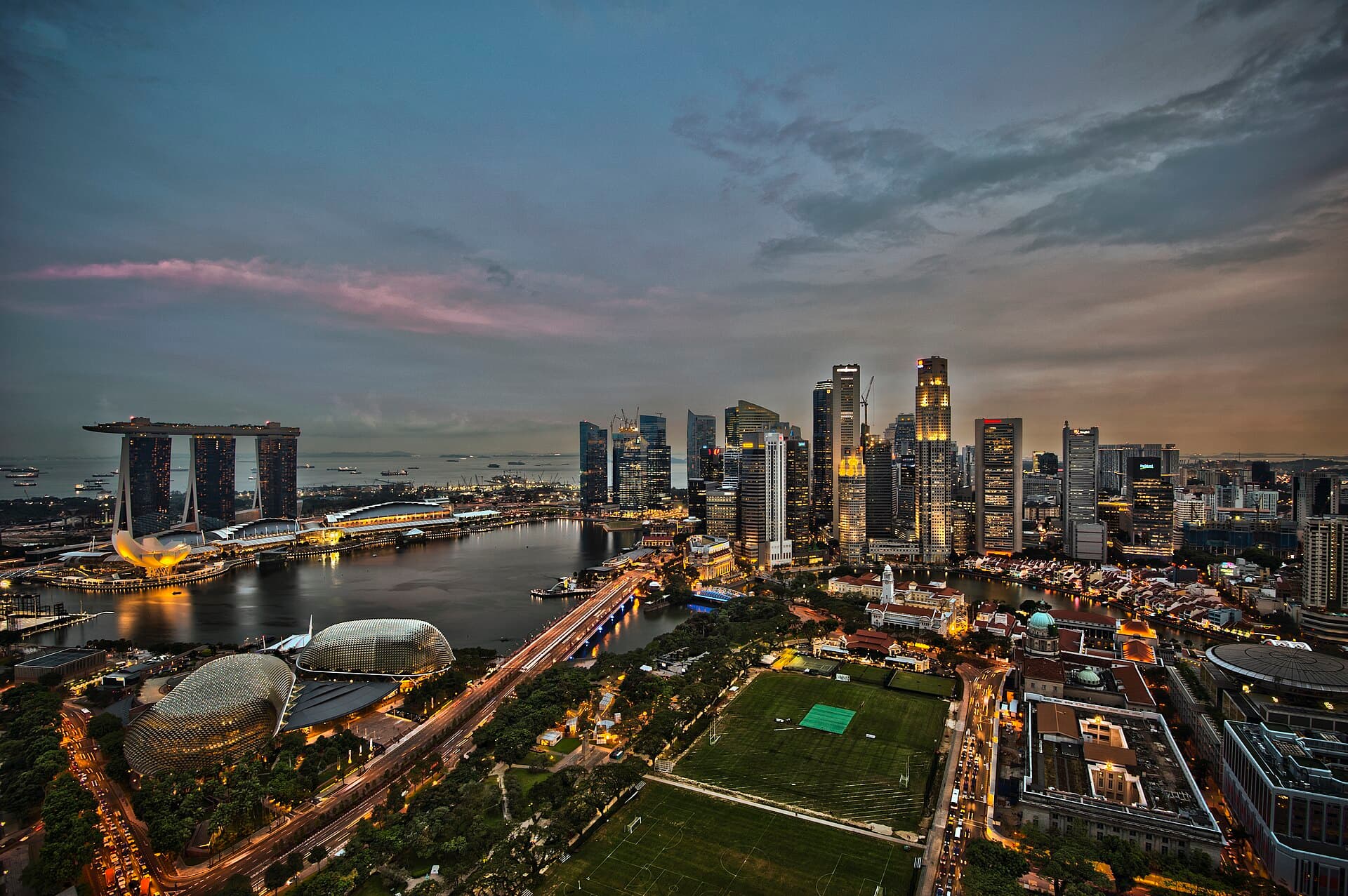Singapore travel planning photo showing Skyline of Boat Quay in Singapore. The cluster of skyscrapers in the right half of the photograph constitutes the Central Business District