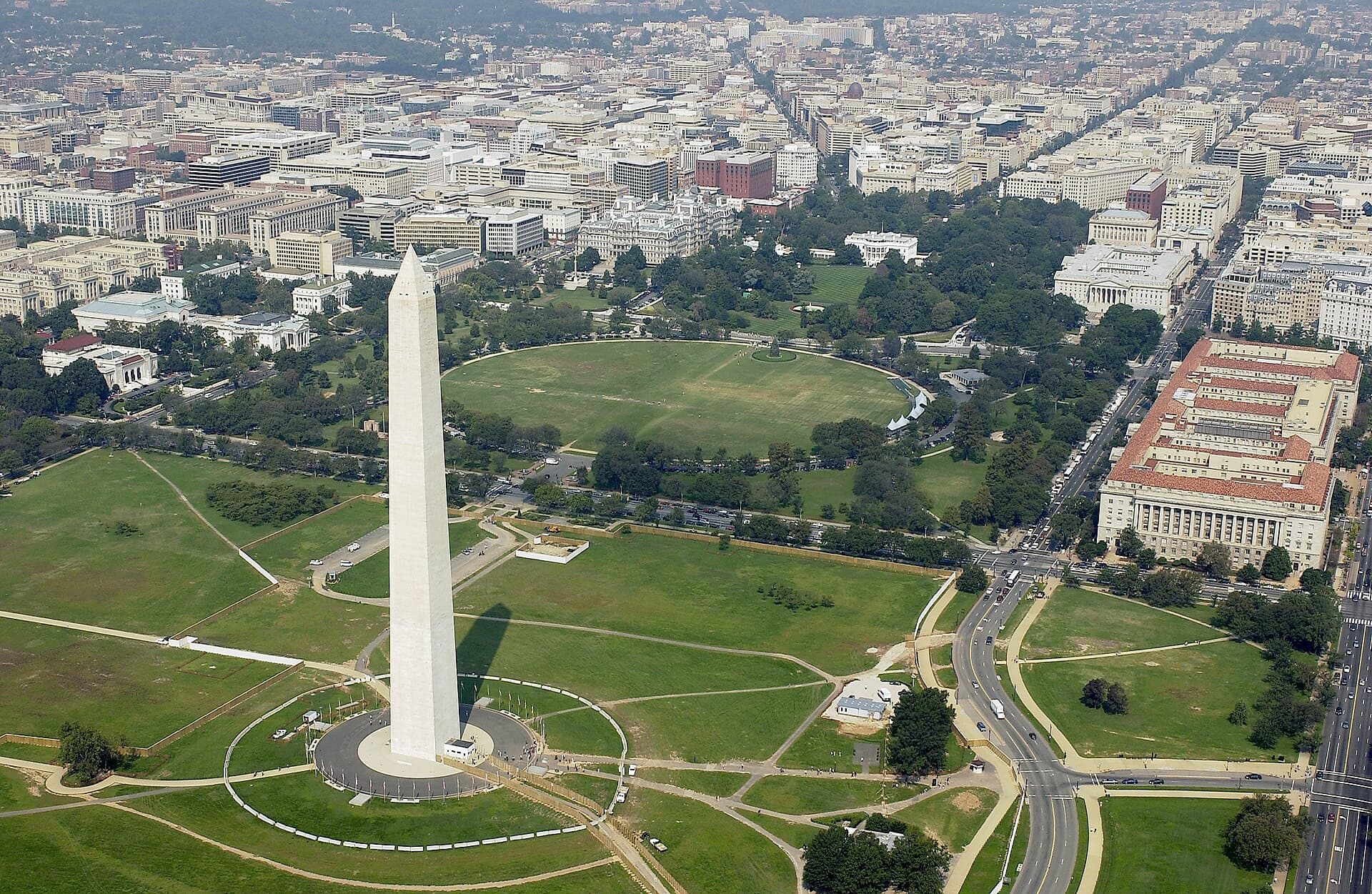 Washington DC travel planning photo showing Washington, D.C. (Sept. 26, 2003) - Aerial view of the Washington Monument with the White House in the background