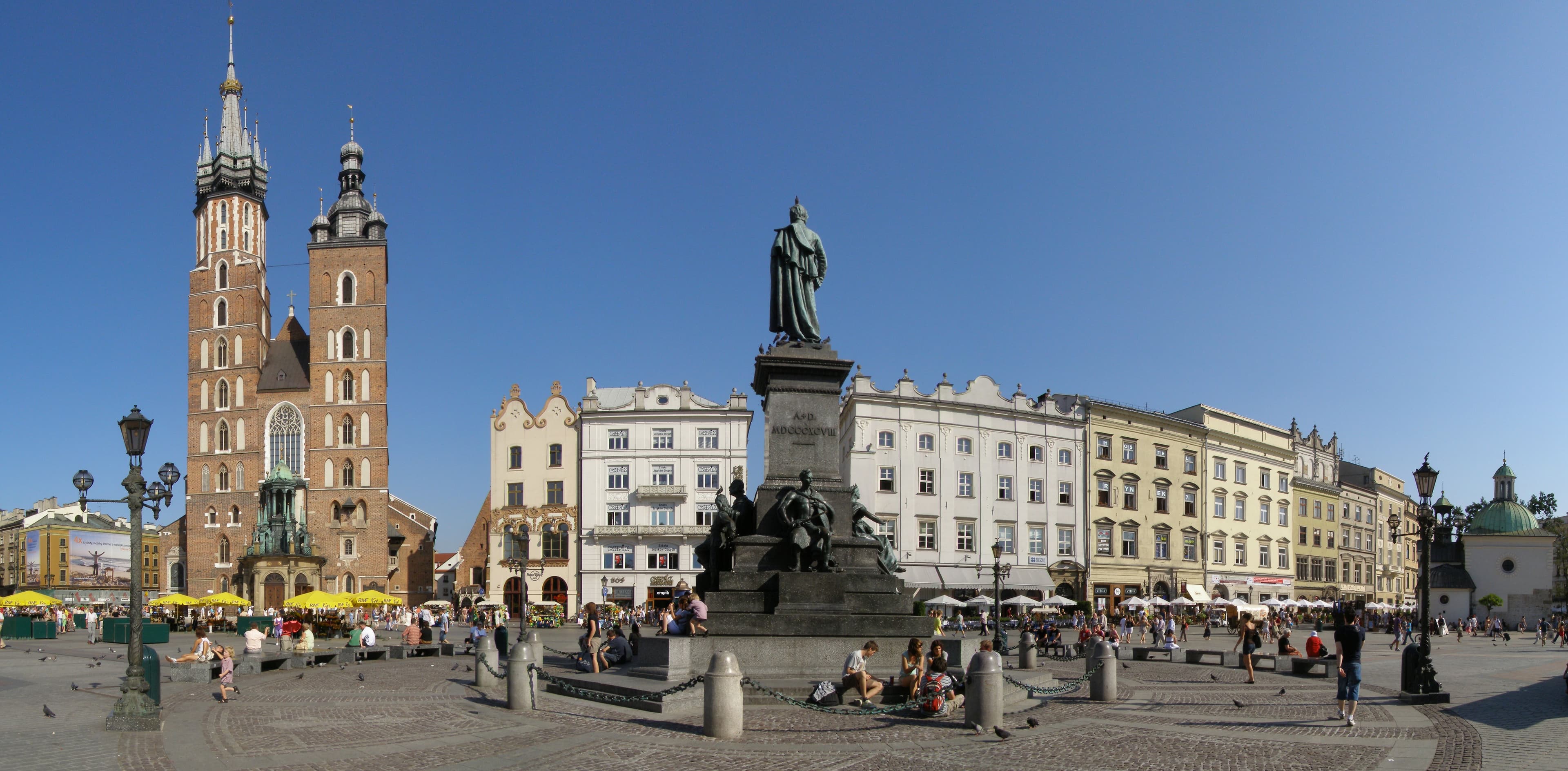 Krakow Main Market Square panorama with historic buildings and church towers